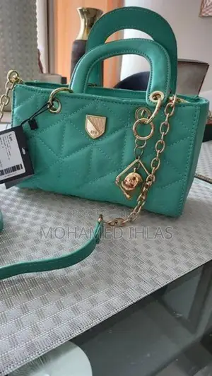 LYN M Structured Top Handbag in Mint Green