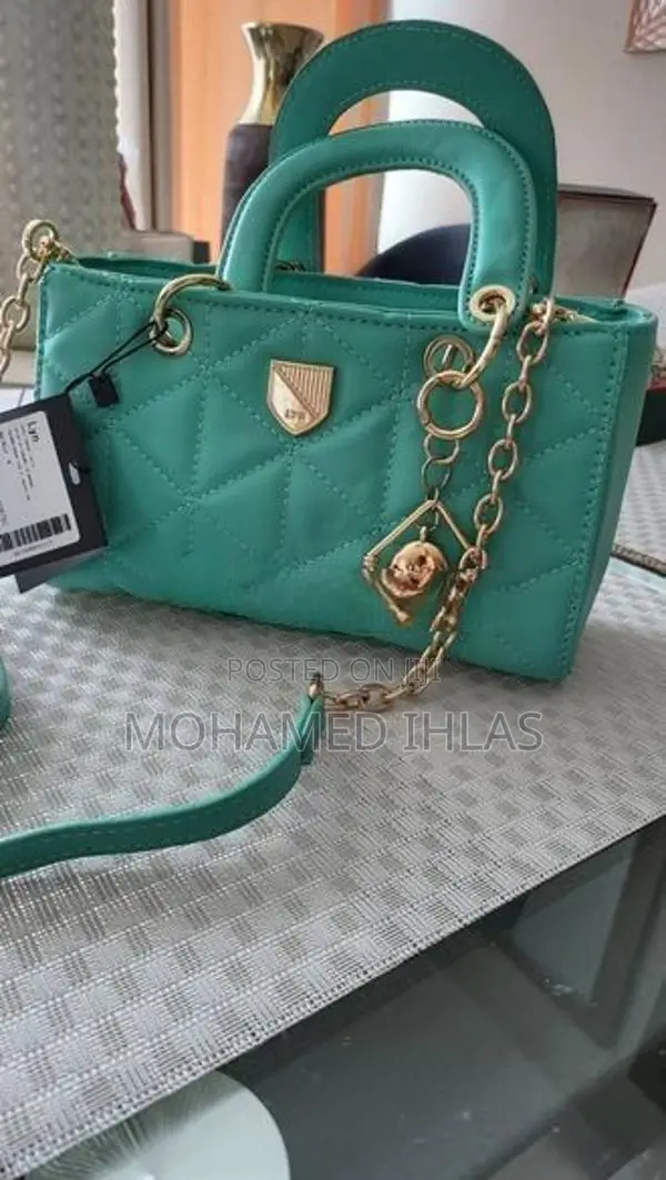LYN M Structured Top Handbag in Mint Green