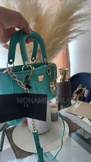 LYN M Structured Top Handbag in Mint Green