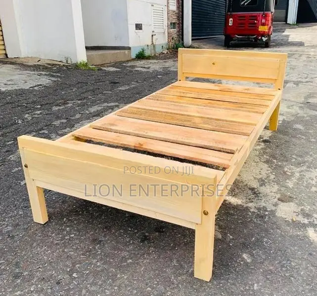 Single wooden beds