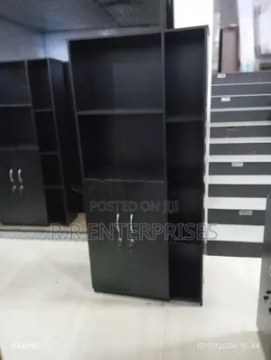 New Black Melamine book cupboard with lookers .