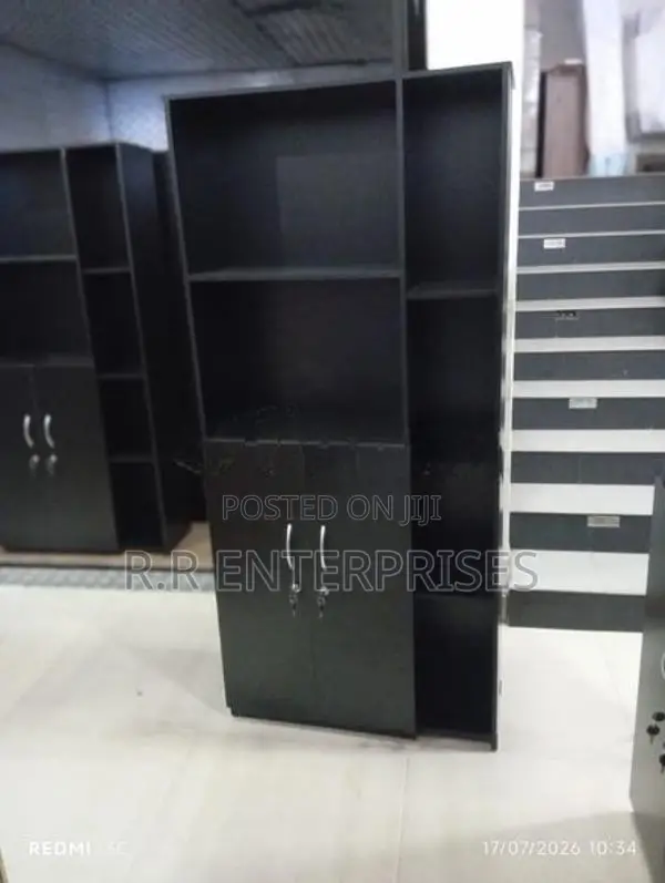 New Black Melamine book cupboard with lookers .