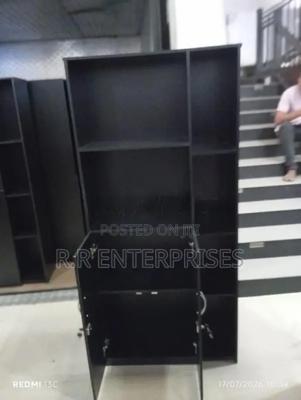 New Black Melamine book cupboard with lookers .