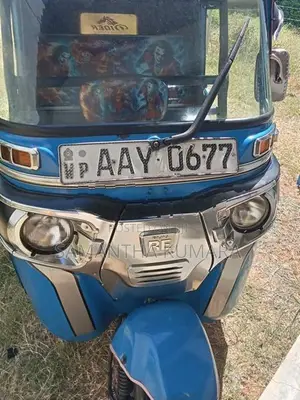 Bajaj RE 4 Stroke 2015