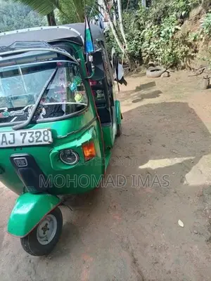 Bajaj RE 2013
