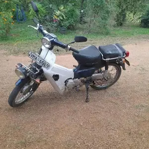 Honda Press cub 2003
