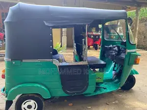 Bajaj RE 2013