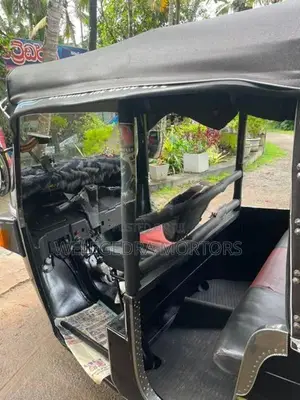 Bajaj RE 2013