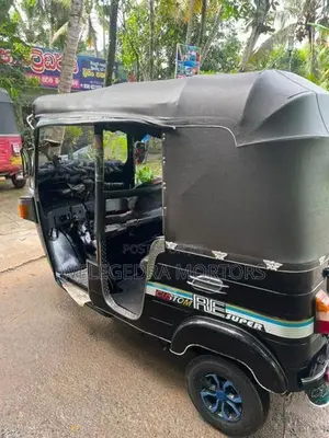 Bajaj RE 2013