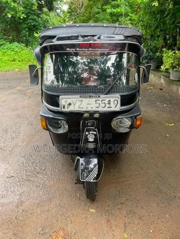 Bajaj RE 2013