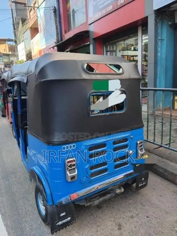 Bajaj RE 2013