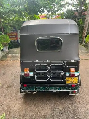 Bajaj RE 2013