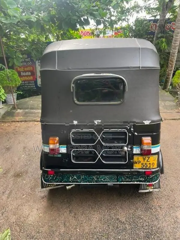 Bajaj RE 2013