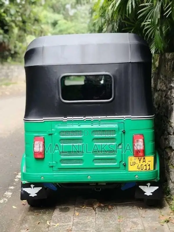 Bajaj RE 2011
