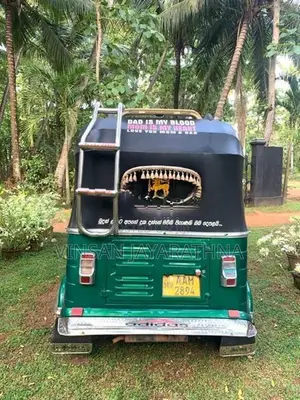 Bajaj RE 2013