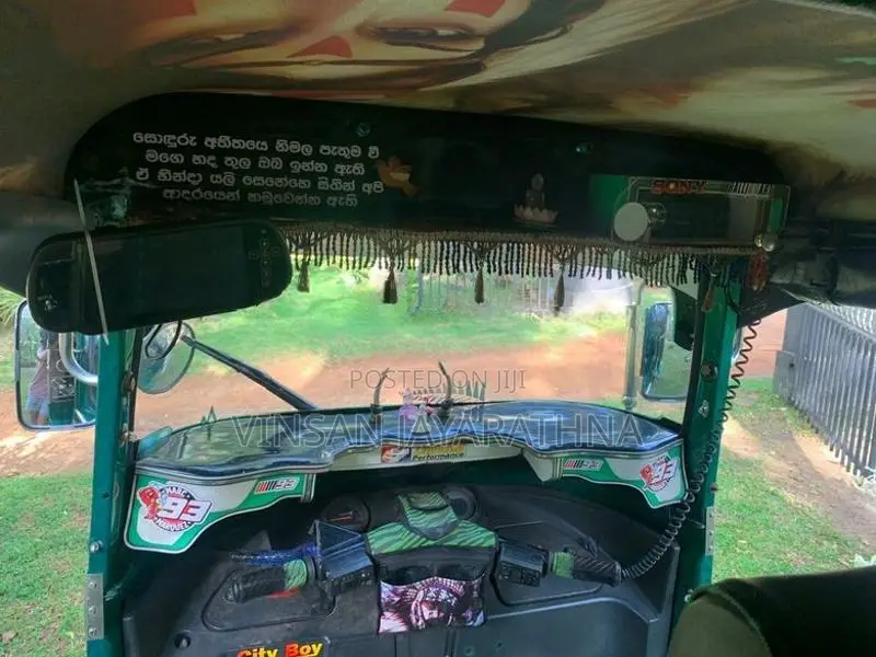 Bajaj RE 2013