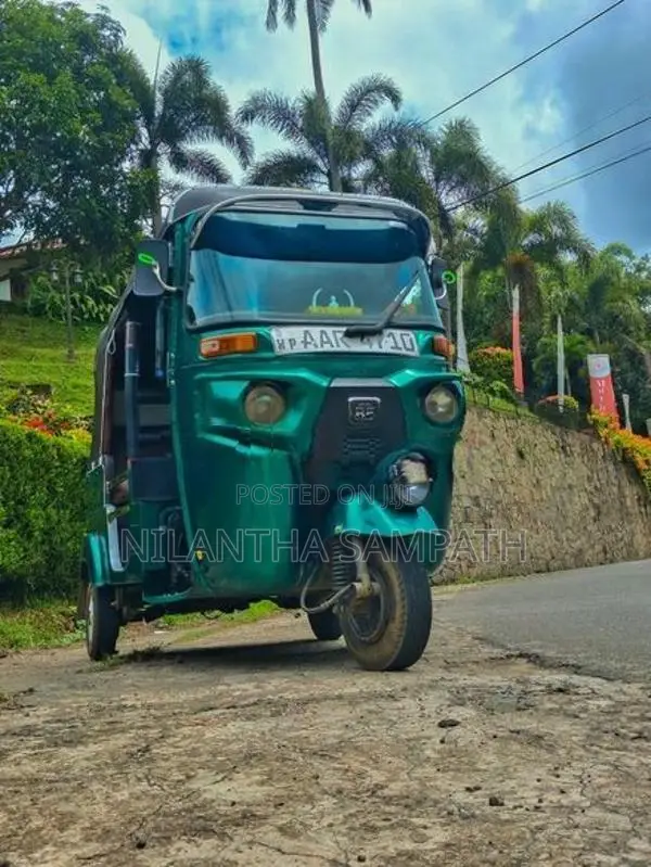 Bajaj RE 2014