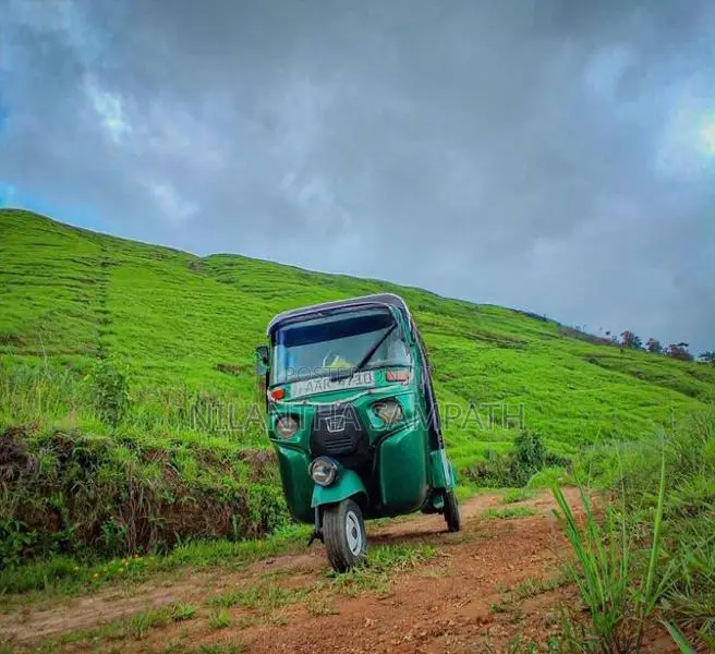 Bajaj RE 2014
