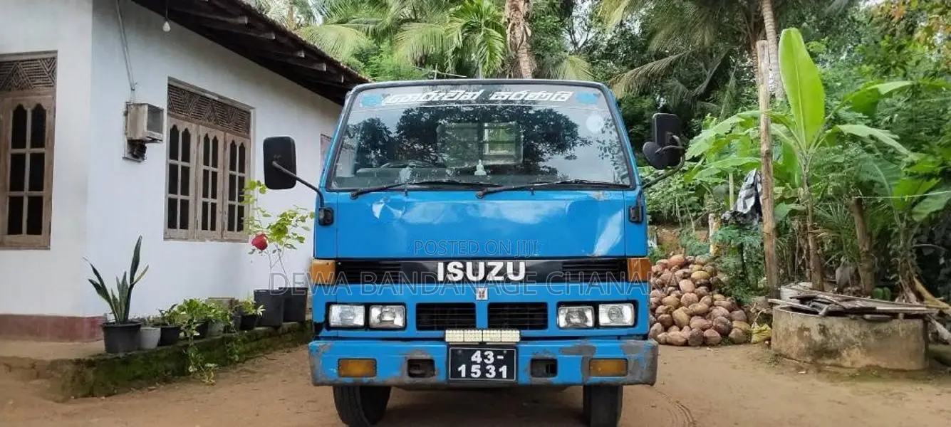 Isuzu ELF 250 Open 1990 Lorry (Used)