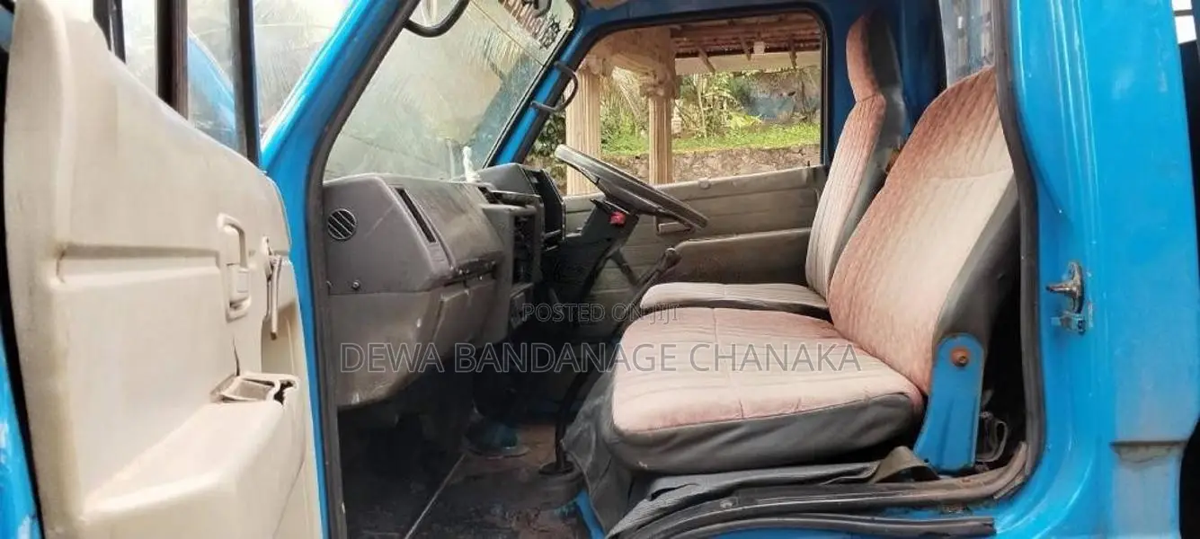 Isuzu ELF 250 Open 1990 Lorry (Used)
