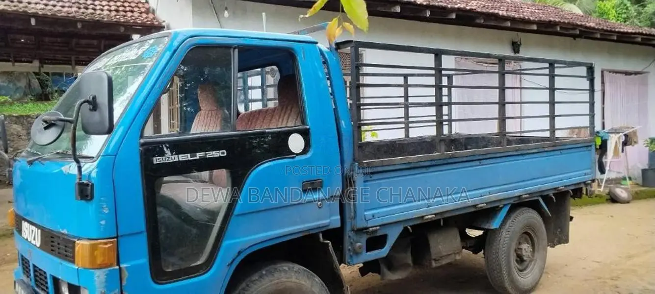 Isuzu ELF 250 Open 1990 Lorry (Used)