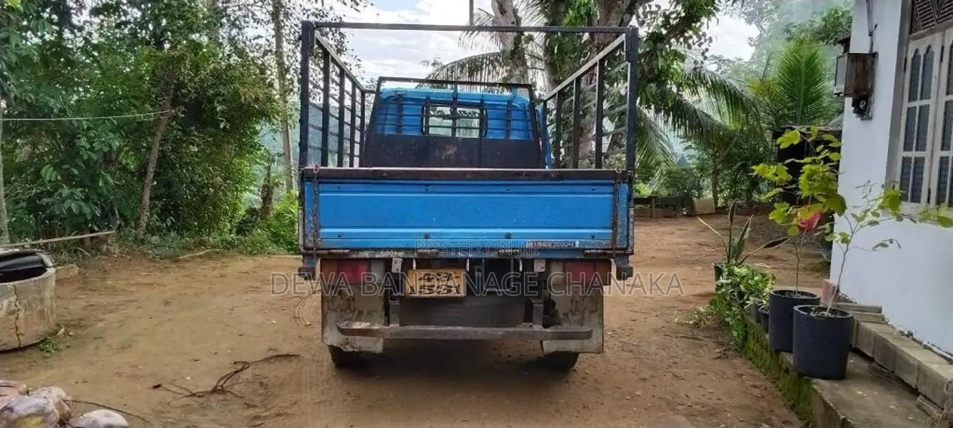 Isuzu ELF 250 Open 1990 Lorry (Used)