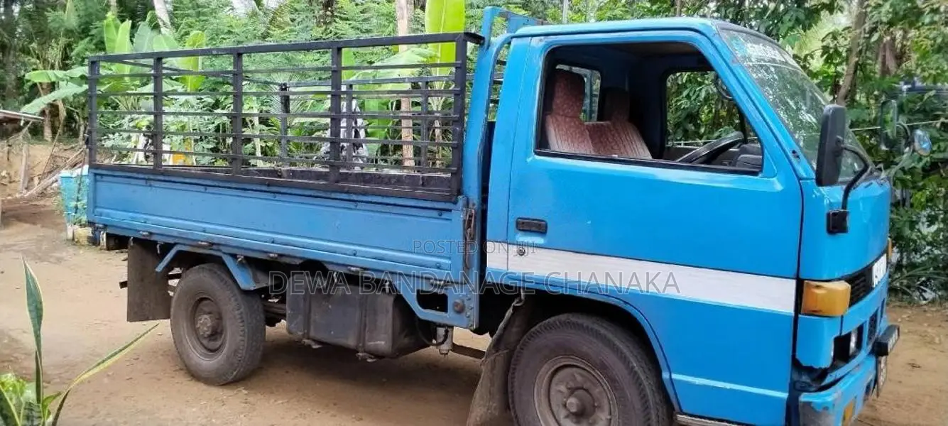 Isuzu ELF 250 Open 1990 Lorry (Used)