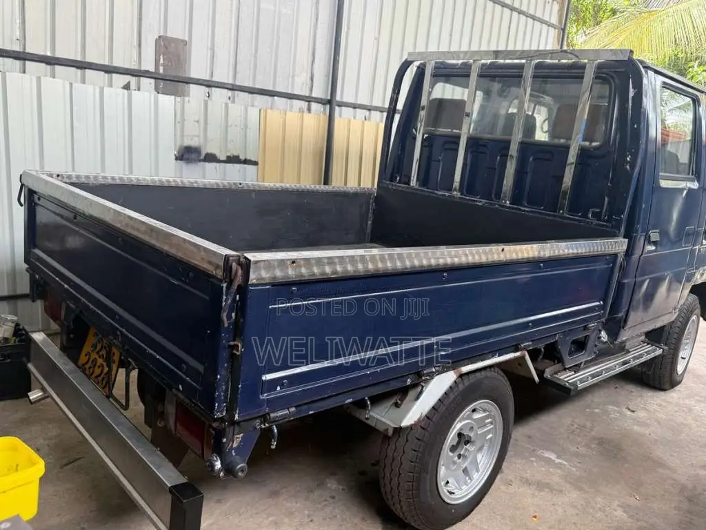 Isuzu ELF 1980 Crew Cab (Used)