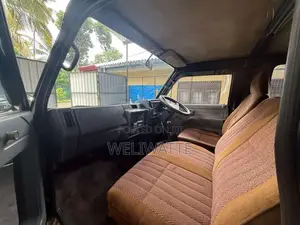 Isuzu ELF 1980 Crew Cab (Used)