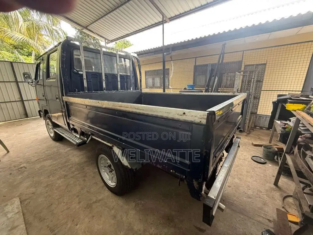 Isuzu ELF 1980 Crew Cab (Used)