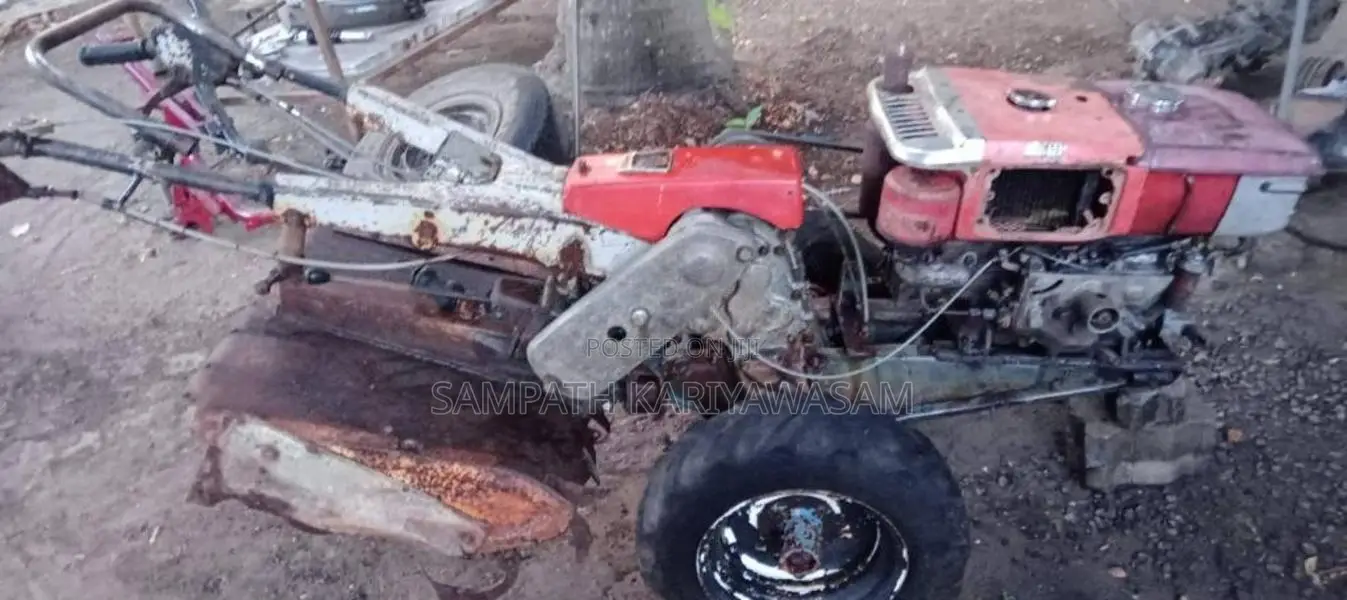 Kubota K75 1990 Tractor (Used)