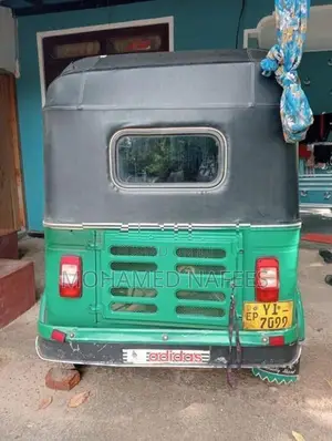 Bajaj RE 2011