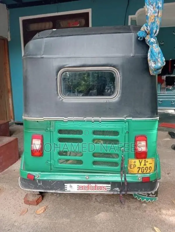 Bajaj RE 2011