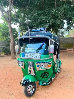Bajaj RE 2013