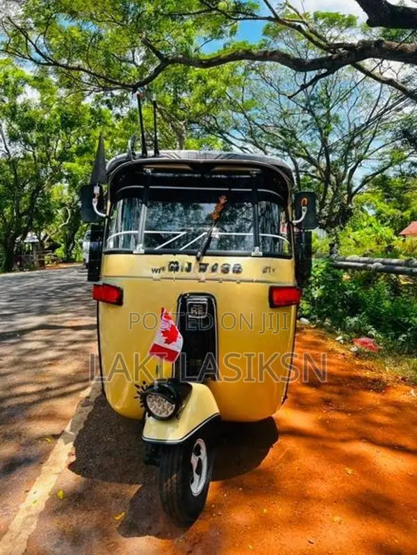 Bajaj RE . 2003
