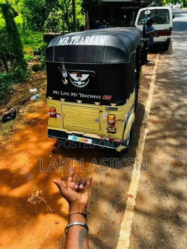Bajaj RE . 2003