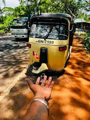 Bajaj RE . 2003