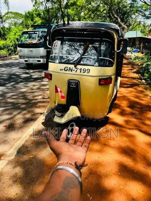 Bajaj RE . 2003