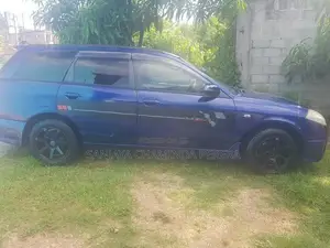 Nissan Wingroad WFY11 2002