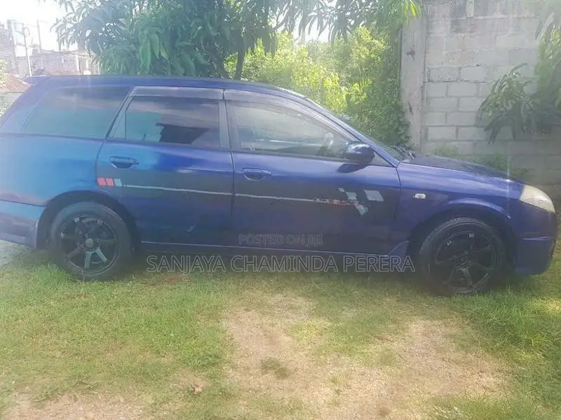 Nissan Wingroad WFY11 2002