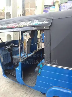 Bajaj RE 2013
