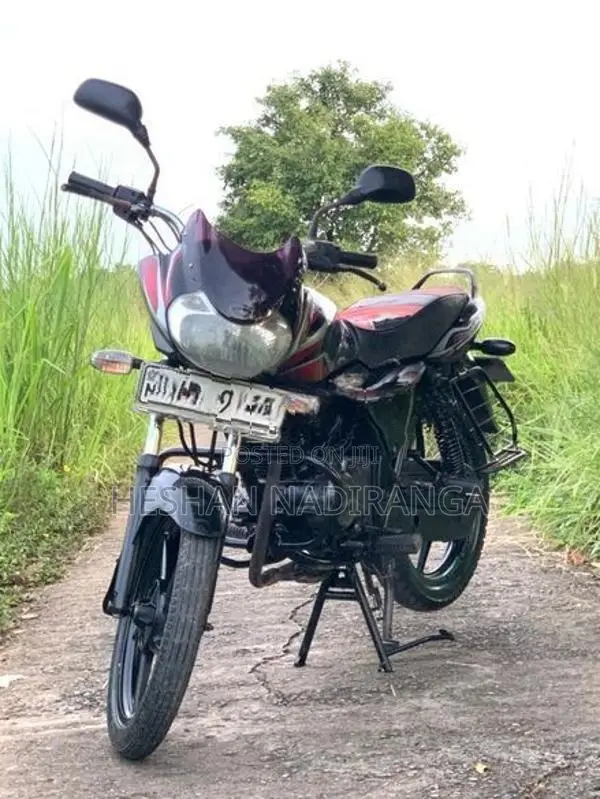 Bajaj Discover black and red 2010