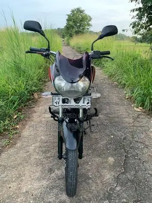 Bajaj Discover black and red 2010