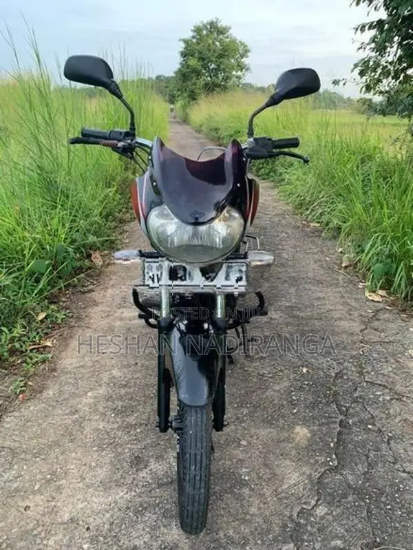 Bajaj Discover black and red 2010