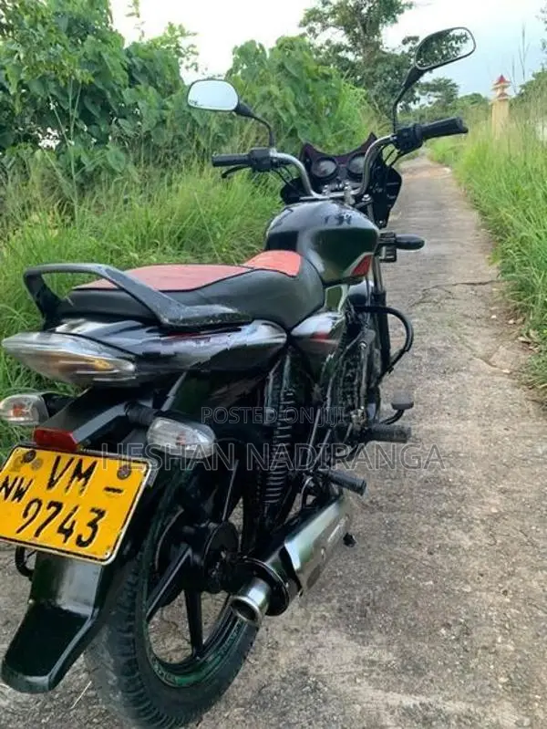 Bajaj Discover black and red 2010
