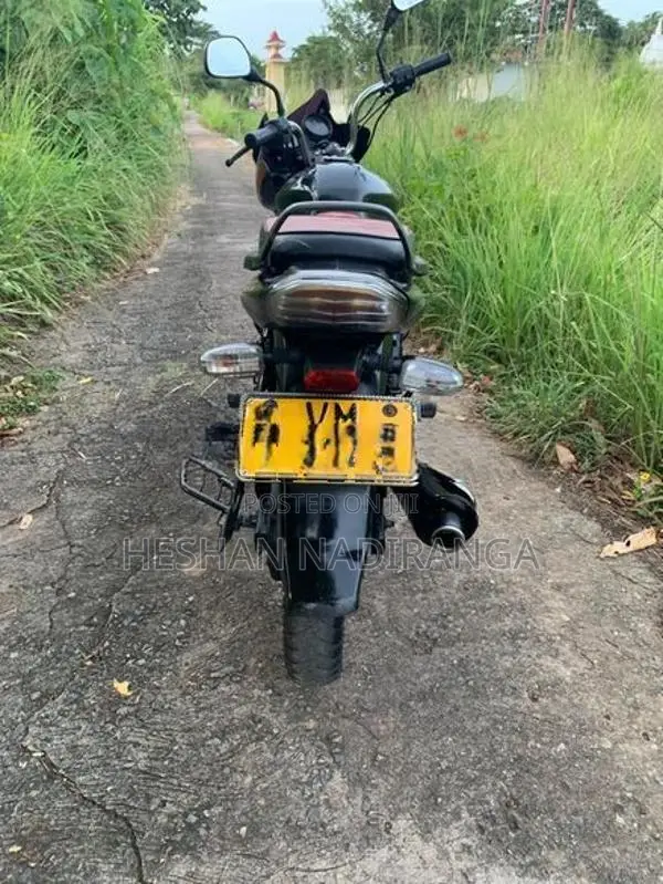 Bajaj Discover black and red 2010