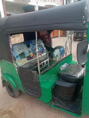 Bajaj RE 2014