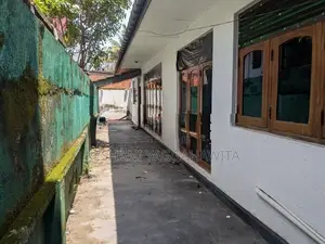 Land with a house for sale