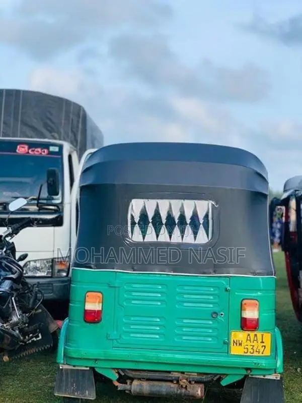 Bajaj RE 2014