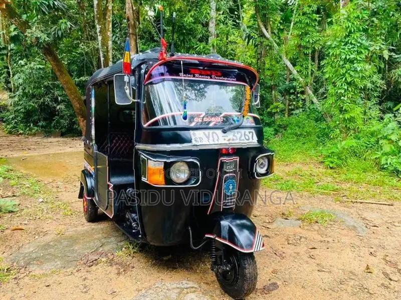 Bajaj RE 2011